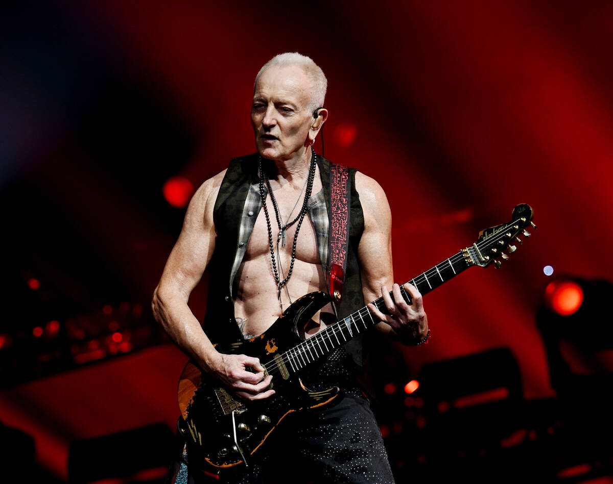 LAS VEGAS, NEVADA - FEBRUARY 03: Guitarist Phil Collen of Def Leppard performs at The Colosseum ...