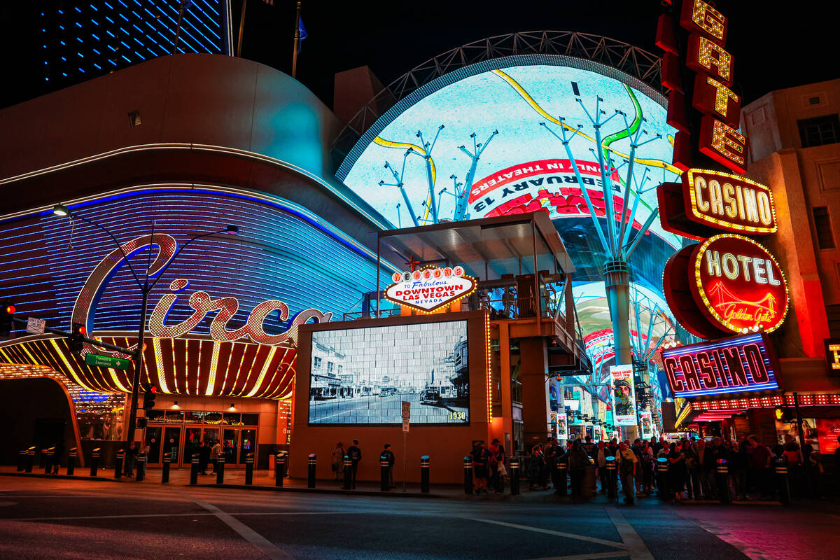 The canopy on Fremont Street is lit up during a pop-up event promoting new film “Good Lu ...