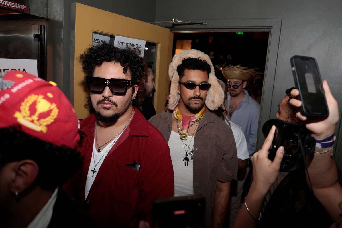 Contestants line up at the Bad Bunny look-alike contest line up at Tacolicious in San Francisco ...