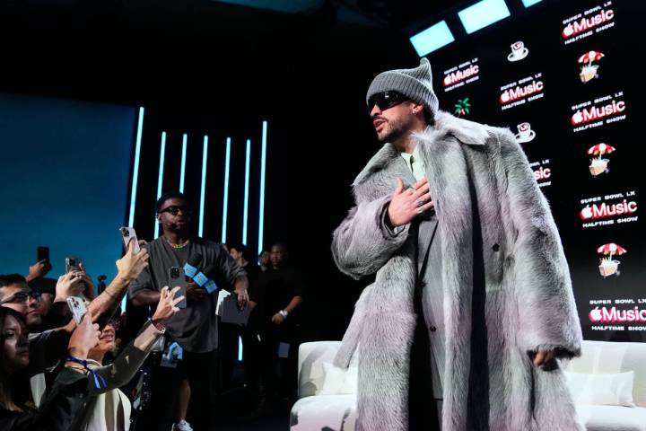 Apple Music Super Bowl LX Halftime Show performer Bad Bunny speaks to the crowd after a news co ...