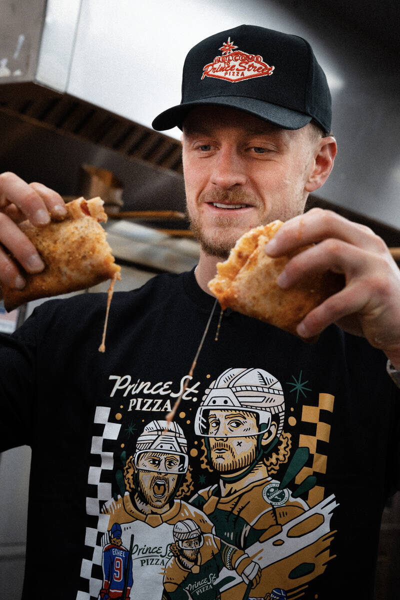 Golden Knights center Jack Eichel (left) shows off his signature menu item, the Jack-Pocket, at ...