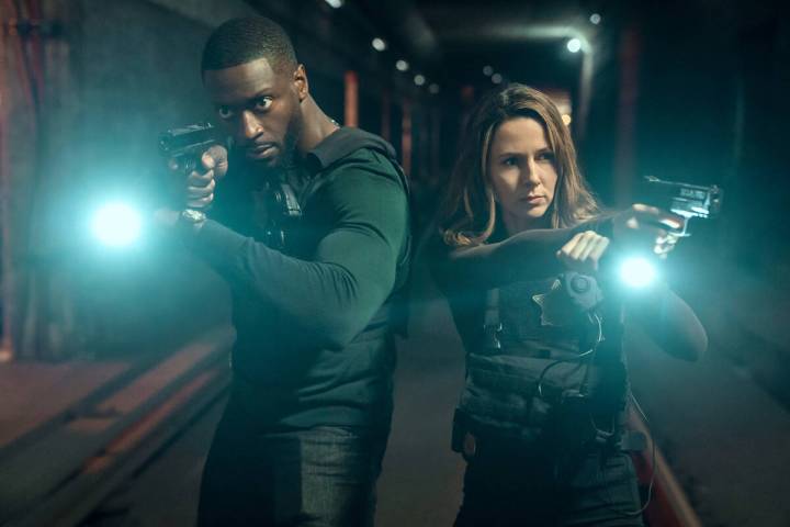 This image released by Prime Video shows Aldis Hodge as Alex Cross, left, and Alona Tal as Kayl ...
