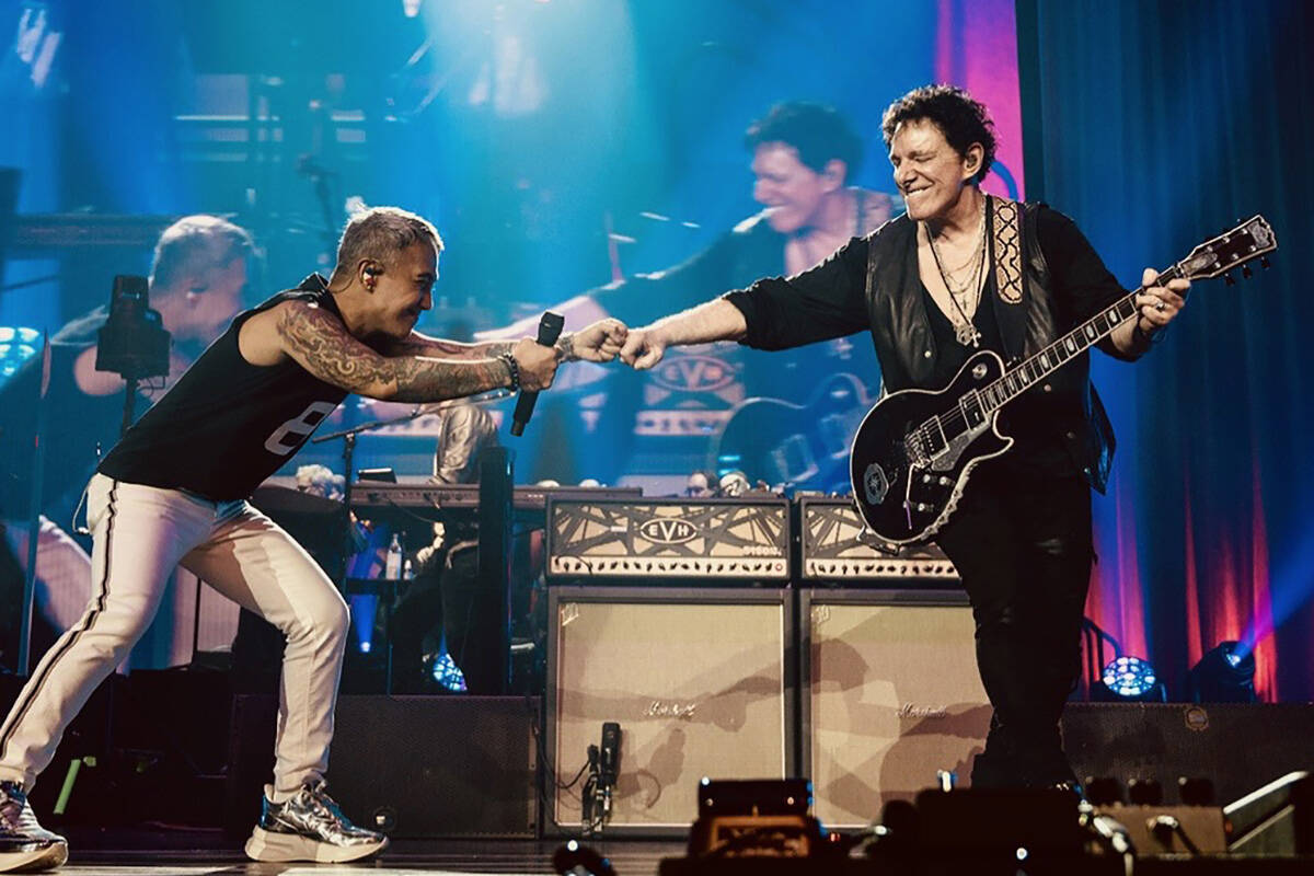 Arnel Pineda and Neal Schon of Journey perform at Resorts World Theatre on Saturday, July 16, 2 ...