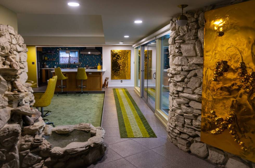 Lomex Las Vegas features artworks in varied settings. Previous page, attendees view “The Drea ...