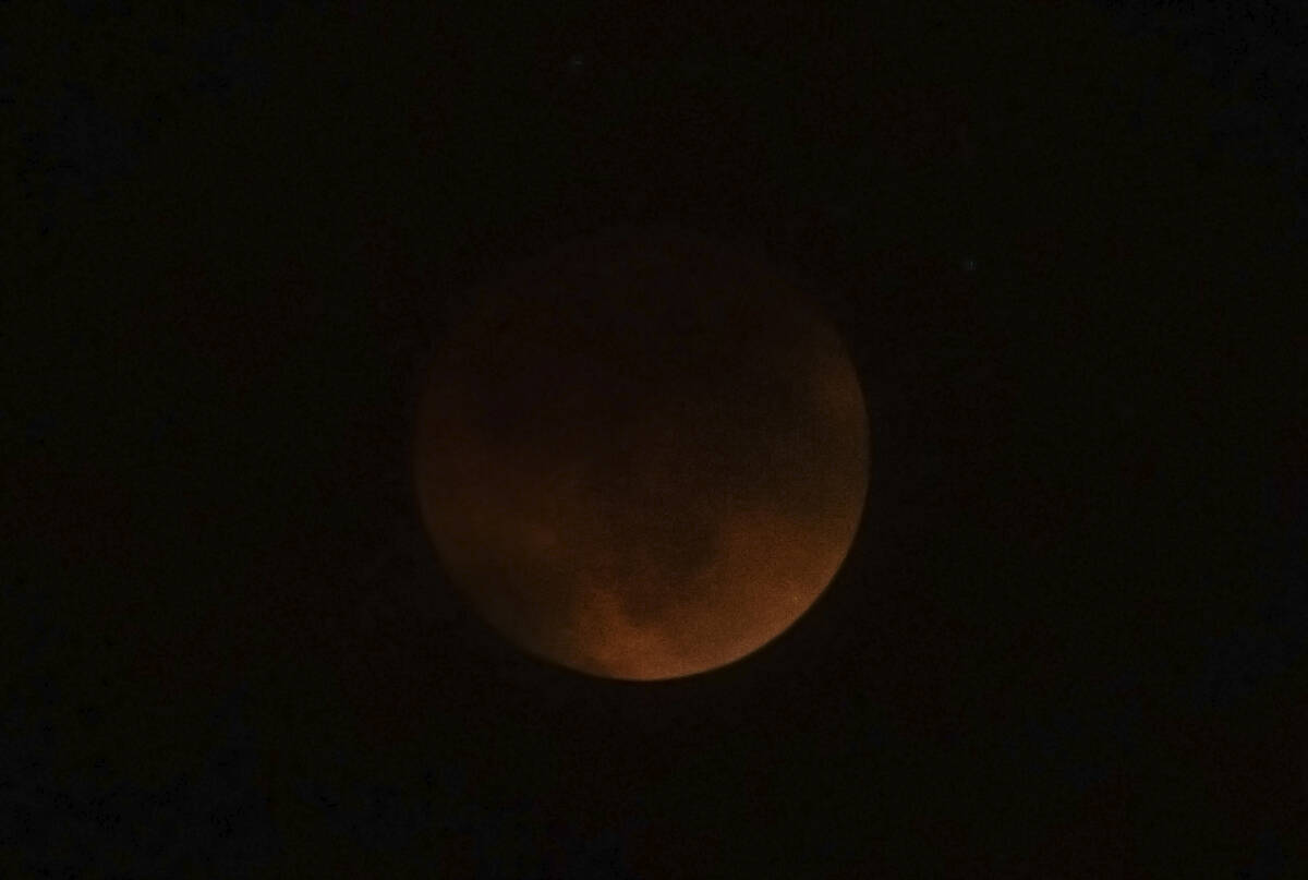 The ‘Super Flower Blood Moon' lunar eclipse on Sunday, May 15, 2022, in Las Vegas. (Benjamin ...