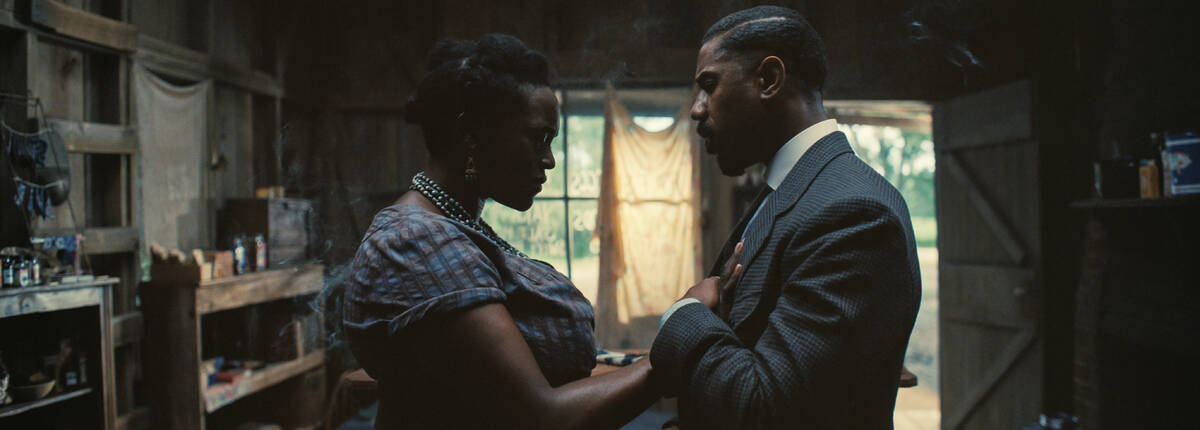 Oscar nominees Wunmi Mosaku and Michael B. Jordan appear in a scene from "Sinners." (Warner Bro ...