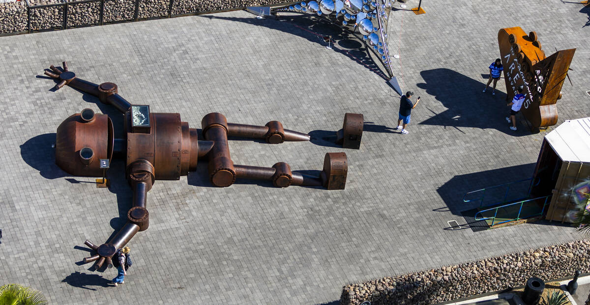Mechan 9 by artist Tyler Fuqua Creations lays in the Southside courtyard amongst other pieces d ...