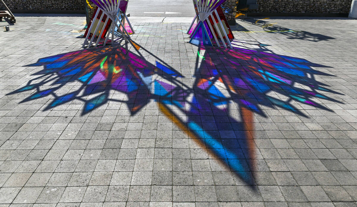 A reflection of Dream Portal by artist Davis McCarty is on display in the Art Island during an ...