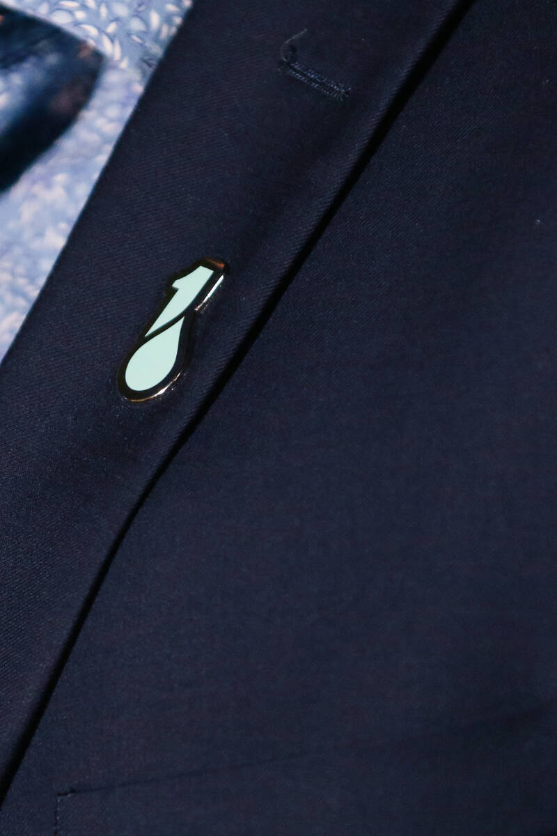 A OneDrop pin decorates a lapel of an attendee at One Drop Foundation's "One Night fo ...