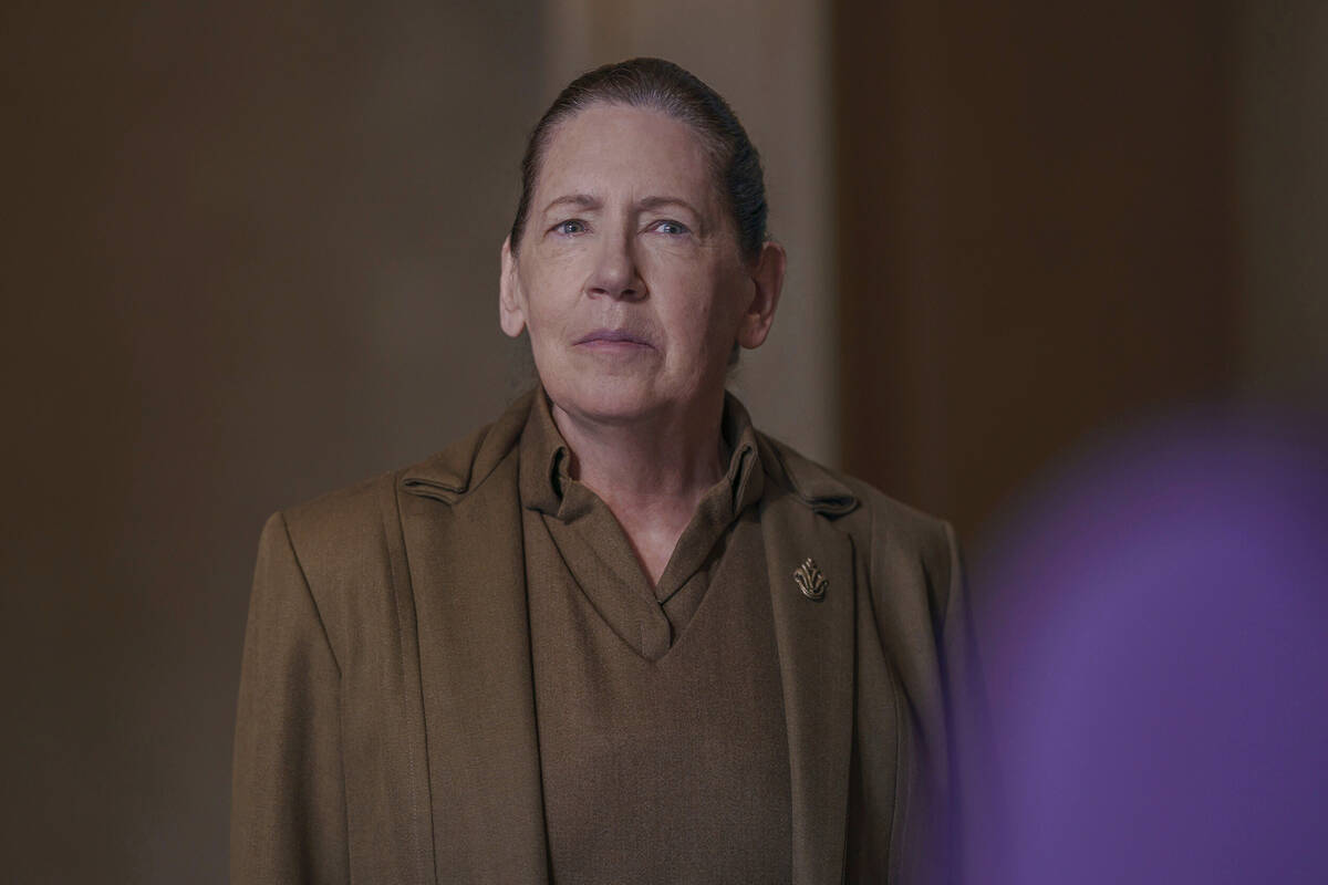 This image released by Disney shows Ann Dowd in a scene from "The Testaments." (Russ ...