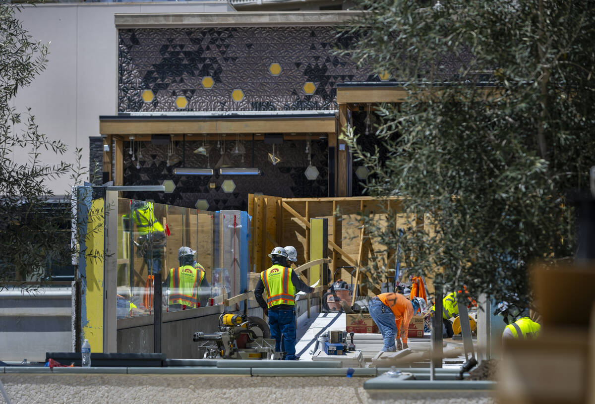 A new pedestrian bridge is completed from the Omnia Nightclub as construction continues on the ...