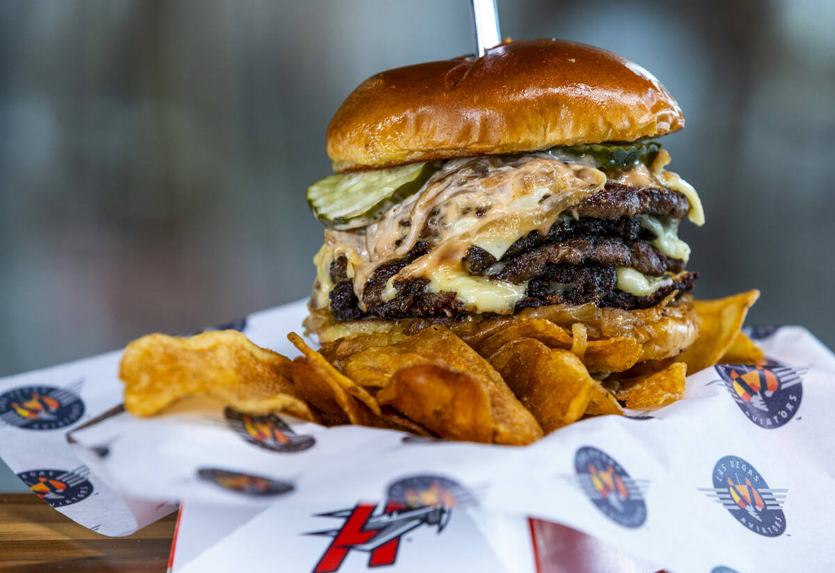 The double triple play burger Is one of the new "Flight Deck" items available from th ...