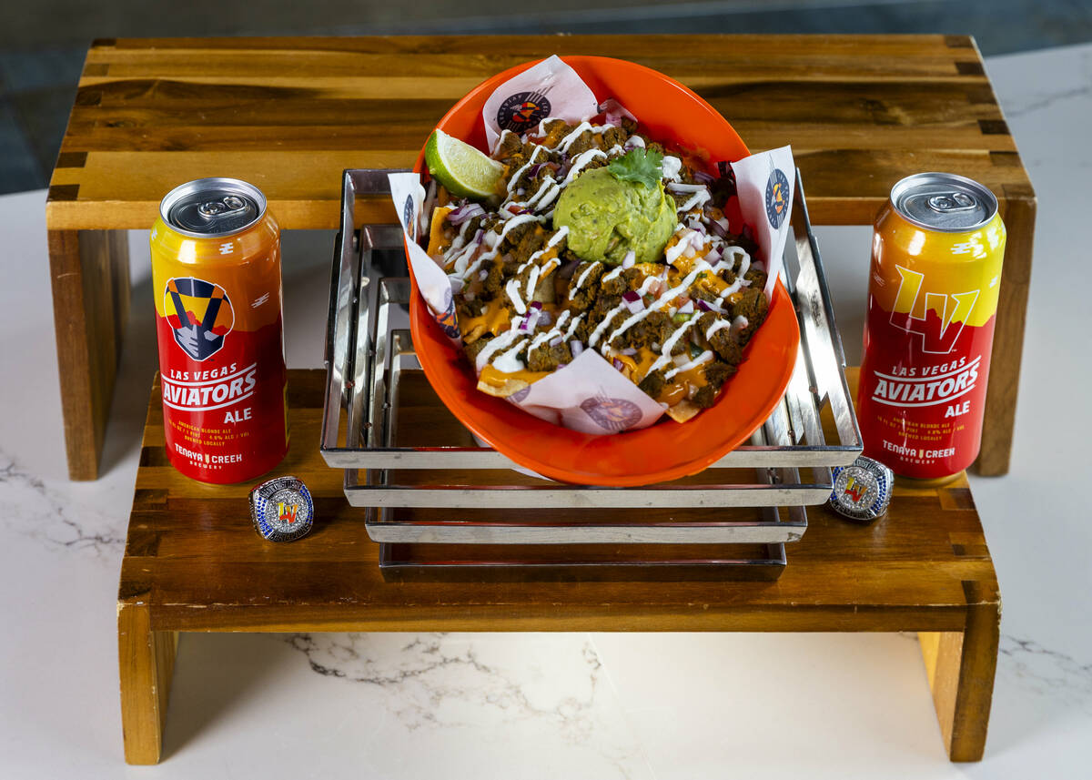 A souvenir carne asada helmet Is one of the new items available from the concessions at the Las ...
