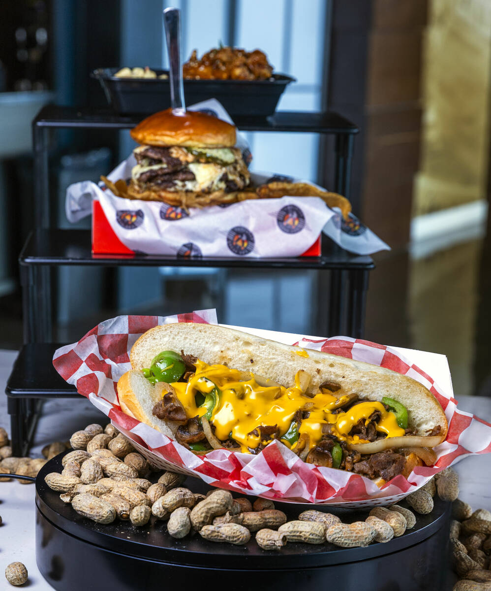 (Front to rear) A Pop's Philly cheesesteak, double triple play burger and chicken teriyaki ...