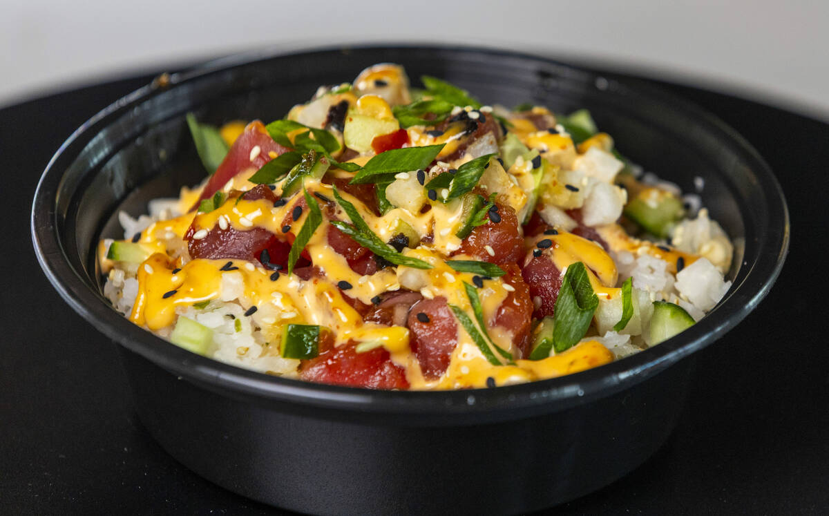 A tuna poke bowl is one of the new "Island Eats" items available from the concessions ...