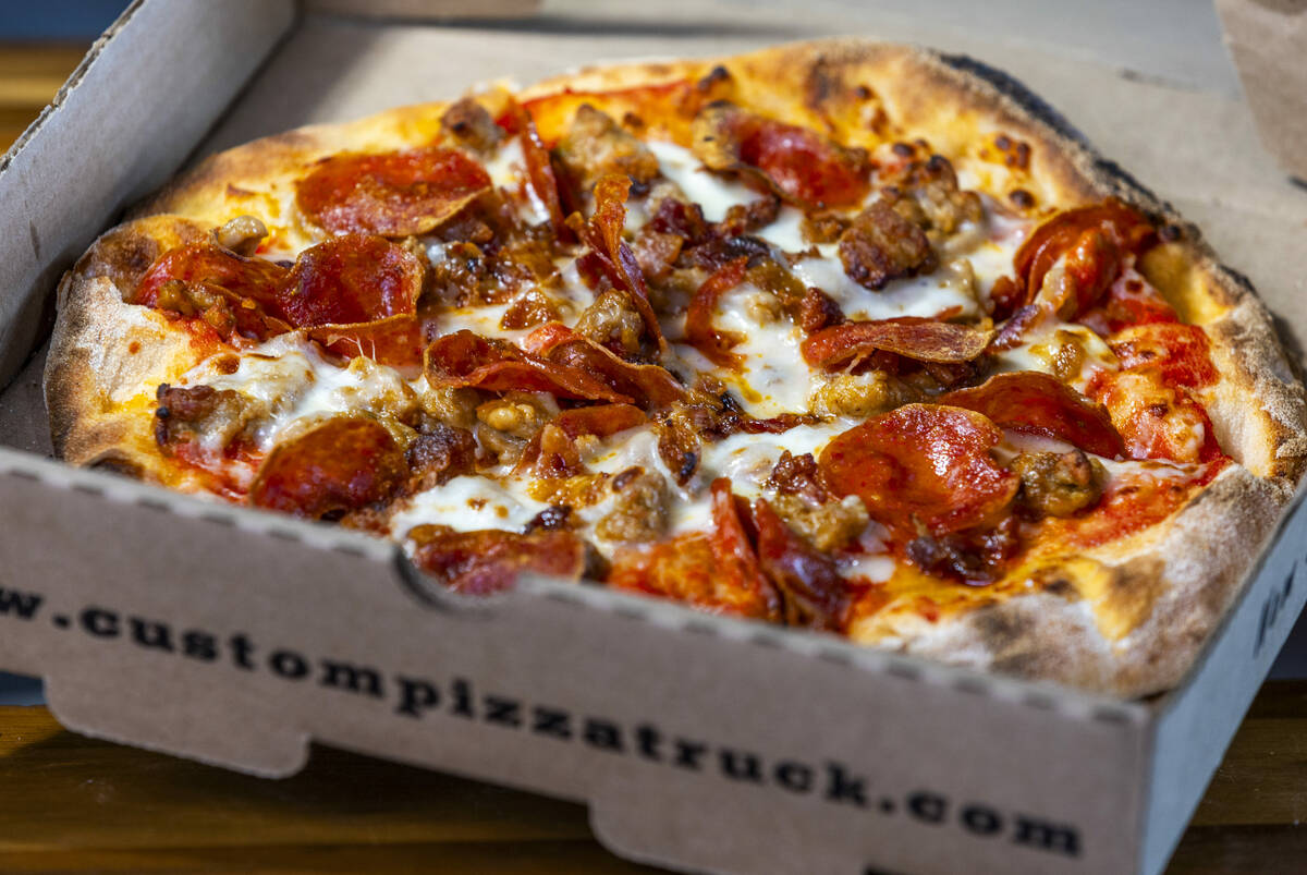 A meat pizza is one of the new items available from the concessions at the Las Vegas Ballpark o ...