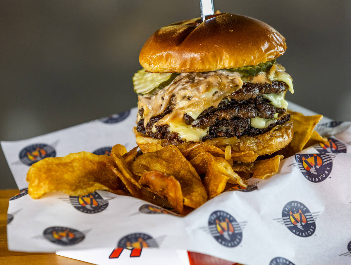 The double triple play burger Is one of the new "Flight Deck" items available from th ...