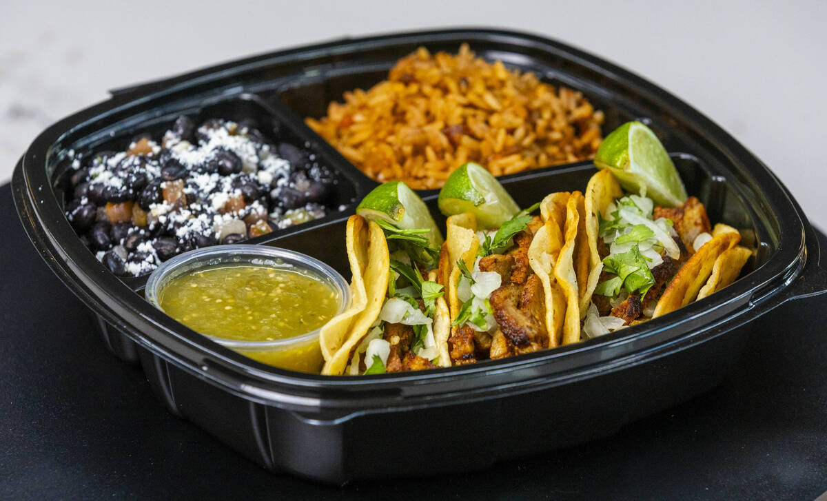 Al pastor tacos are one of the new "Tacos de Reyes" items available from the concessi ...