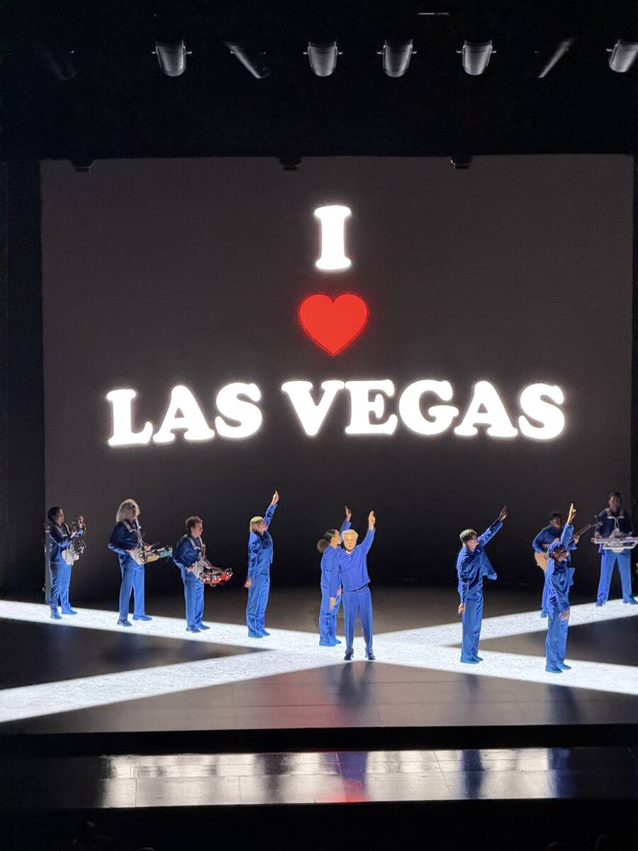 David Byrne shows the result of his gift-shop adventures in his "Who Is the Sky?" tour stop at ...