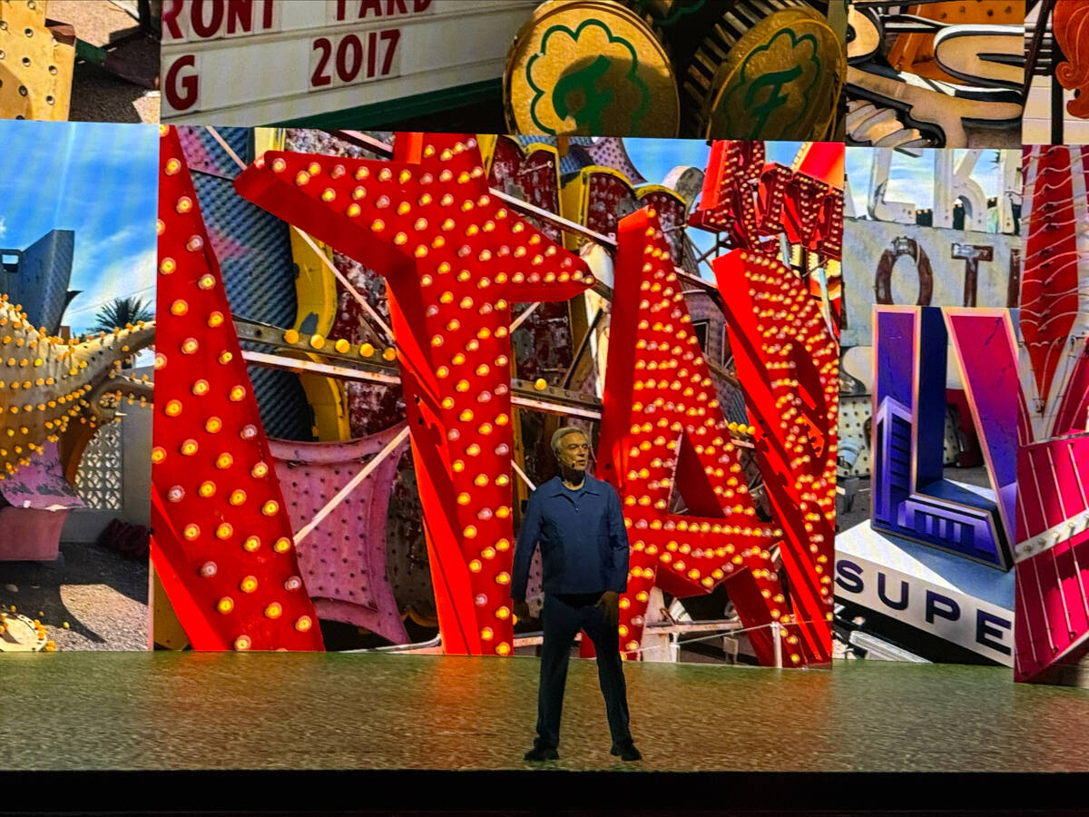 David Byrne shows off his Neon Museum photo exhibit during his "Who Is the Sky?" tour stop at t ...