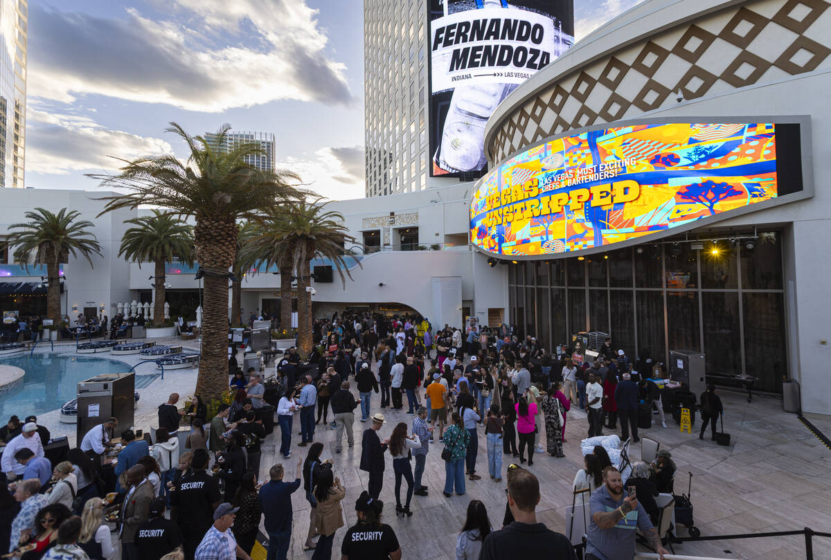 People explore the various food and beverage offerings during Vegas Unstripped at the Palms on ...