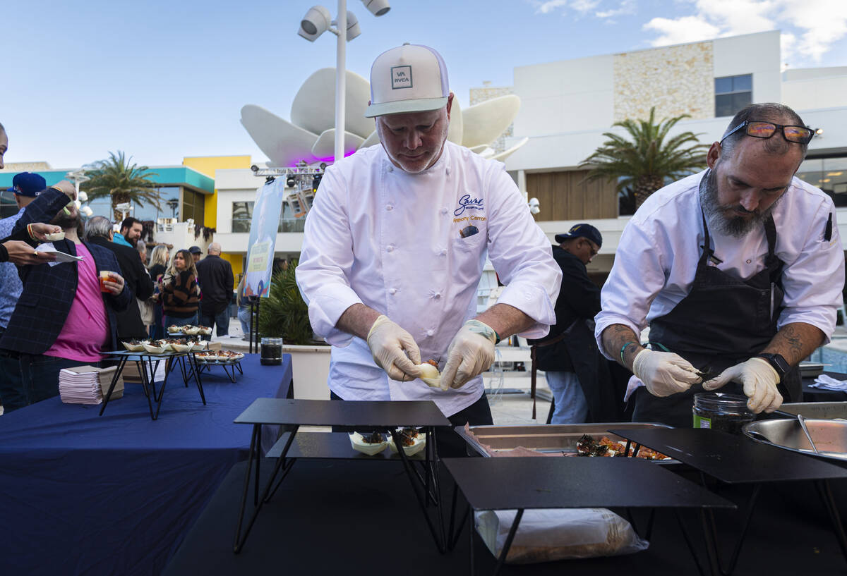 Chef Anthony Carron of Savor Hospitality prepares dishes of toro “deviled” egg wi ...