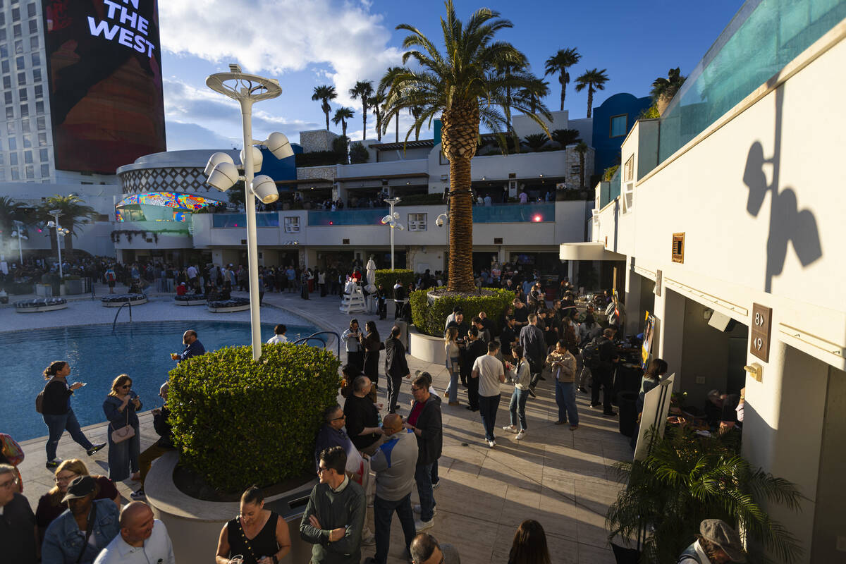 People explore the various food and beverage offerings during Vegas Unstripped at the Palms on ...