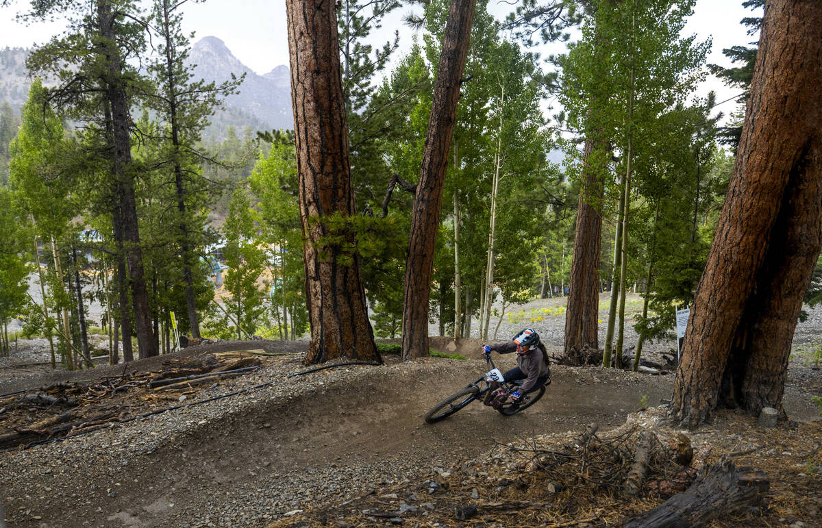 Woman's open rider Renee Shimada navigates a banked turn during the Viva La Gravity four-p ...