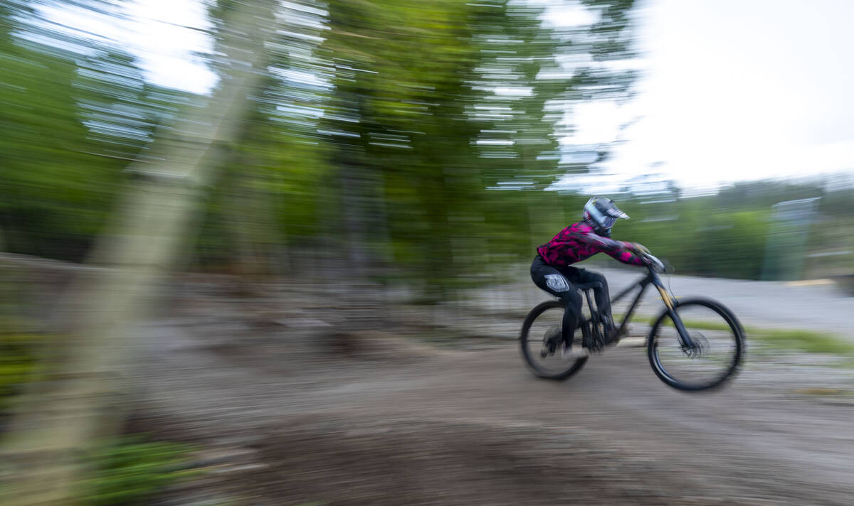 A competitor navigates over a berm during the Viva La Gravity four-part, unsanctioned, communit ...
