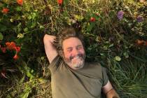 This image released by Netflix shows Zach Galifianakis from his gardening series "This Is ...