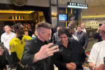 David Copperfield poses for a selfie with magician Chris Funk at the close of Copperfield's sho ...