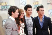 Cast members, from left, Nick Jonas, Demi Lovato, Joe Jonas and Kevin Jonas attend the premiere ...