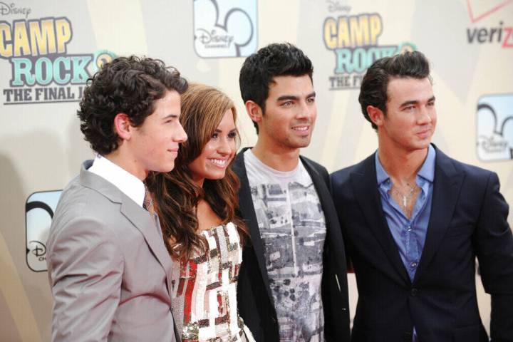 Cast members, from left, Nick Jonas, Demi Lovato, Joe Jonas and Kevin Jonas attend the premiere ...