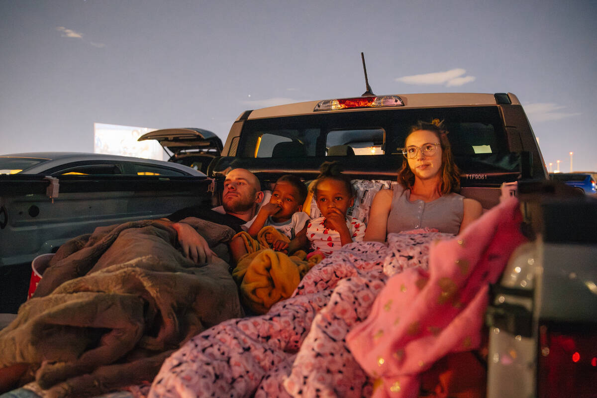 A family watches a movie at The West Wind Drive-In Friday, April 24, 2026, in Las Vegas. (Madel ...