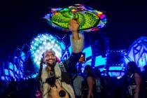 Brandon Anderson twirls an illuminated cloth about the Cosmic Meadow stage during the first nig ...