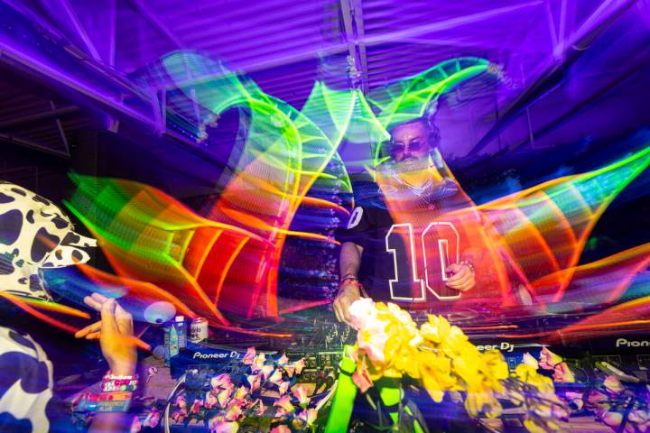 DJ Tripps performs at the Blacklight Bar during the final night of the Electric Daisy Carnival ...