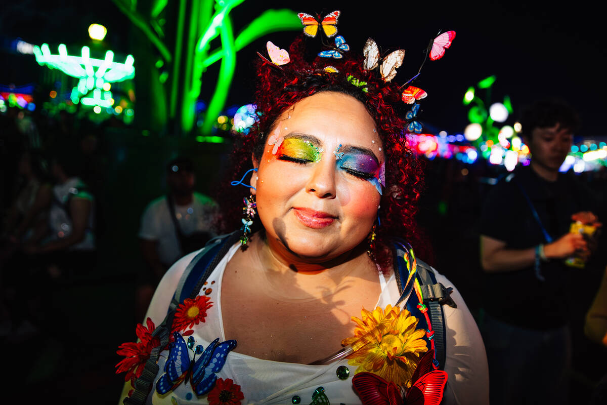 An attendee shows off her eye makeup during day two of Electric Daisy Carnival at Las Vegas Mot ...