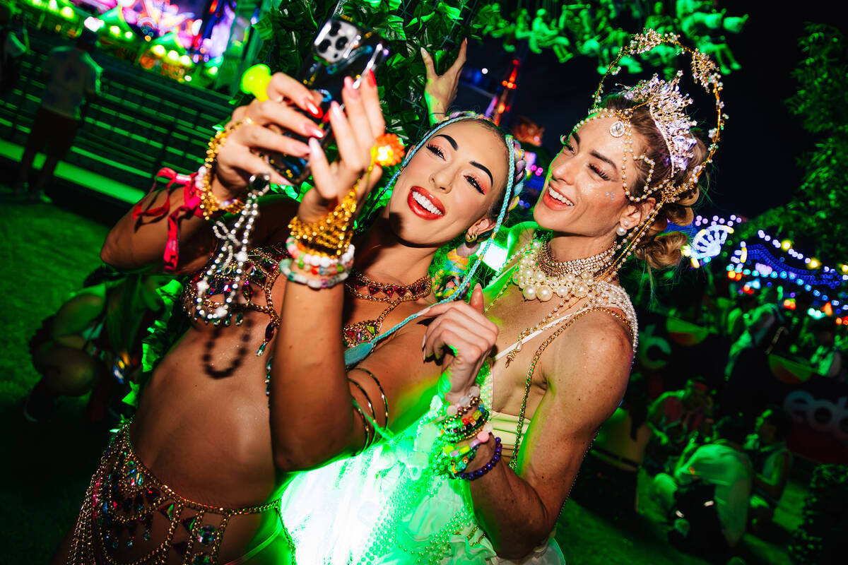 Attendees take a selfie during day two of Electric Daisy Carnival at Las Vegas Motor Speedway S ...