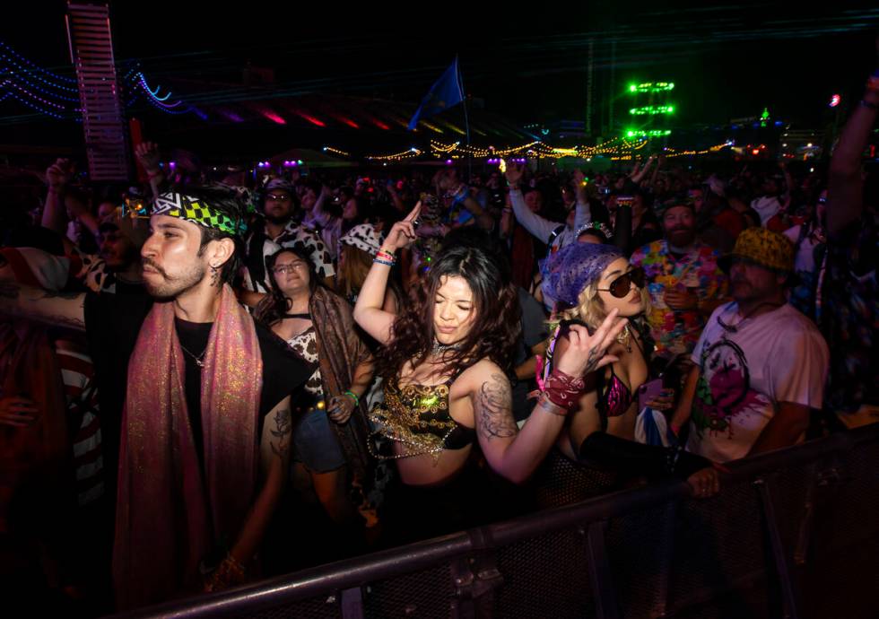People dance at the Wasteland stage during the final night of the Electric Daisy Carnival at La ...