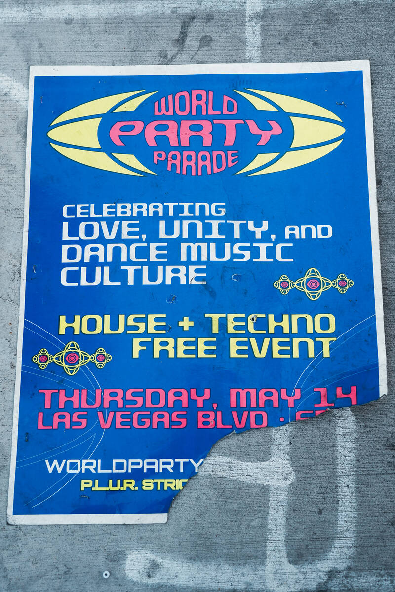 World Party Parade poster lays on the ground following debut of an Electric Daisy Carnival para ...