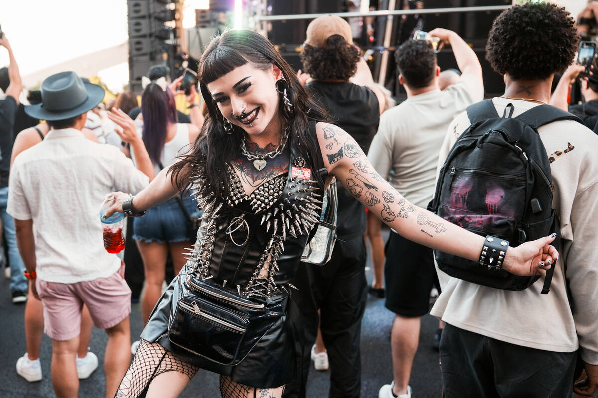 World Party parade goer Kenzie Friend dances during the debut of the Electric Daisy Carnival pa ...