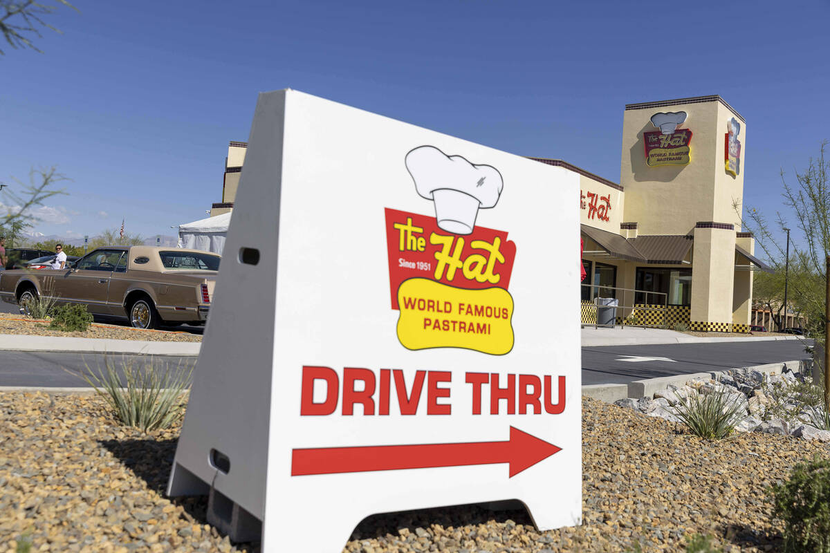 Signage shows the way to the drive thru at The Hat during the restaurant’s grand opening ...