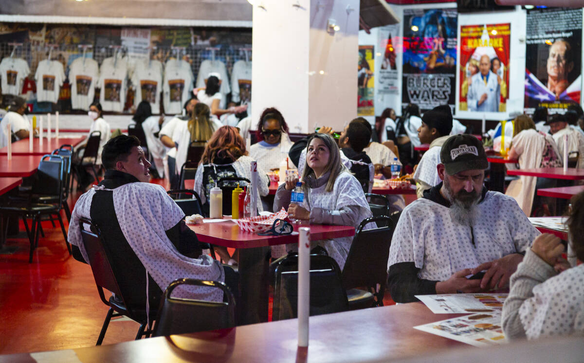 People dine at the Heart Attack Grill in downtown Las Vegas on Saturday, Nov. 21, 2020. (Chase ...