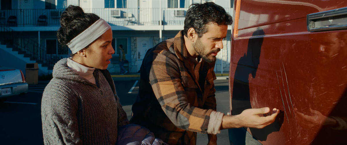 Lou Llobell and Josh Scipio in "Passenger." (Paramount)