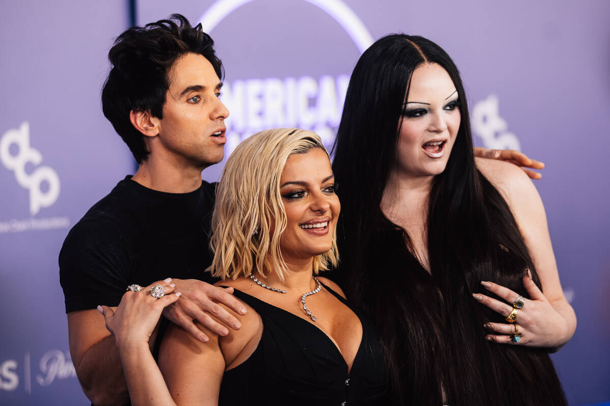 Meg Stalter and Paul W. Downs are joined by Bebe Rexha on the American Music Awards red carpet ...