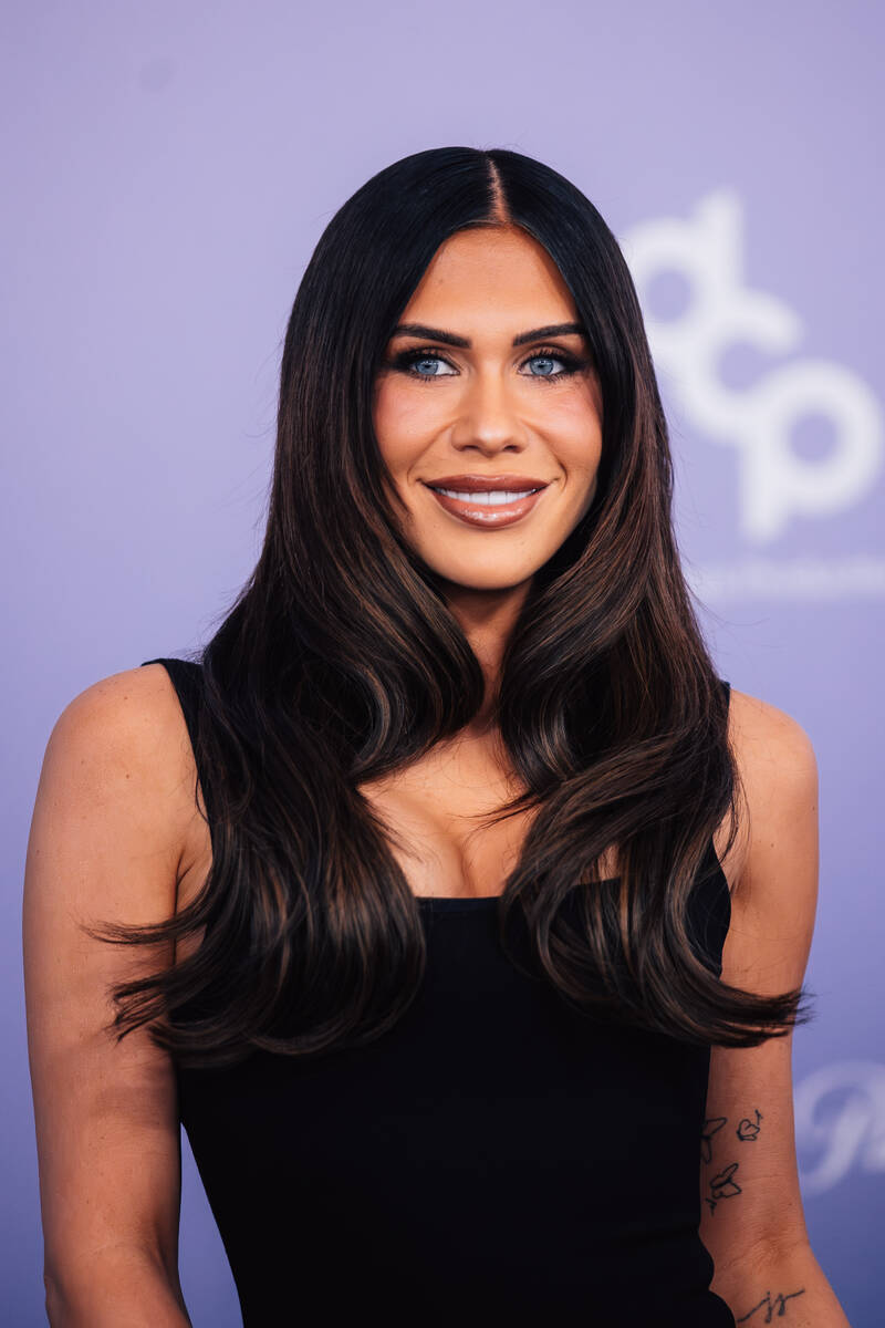 Jessi Draper on the American Music Awards red carpet at MGM Grand Garden Arena Monday, May 25, ...