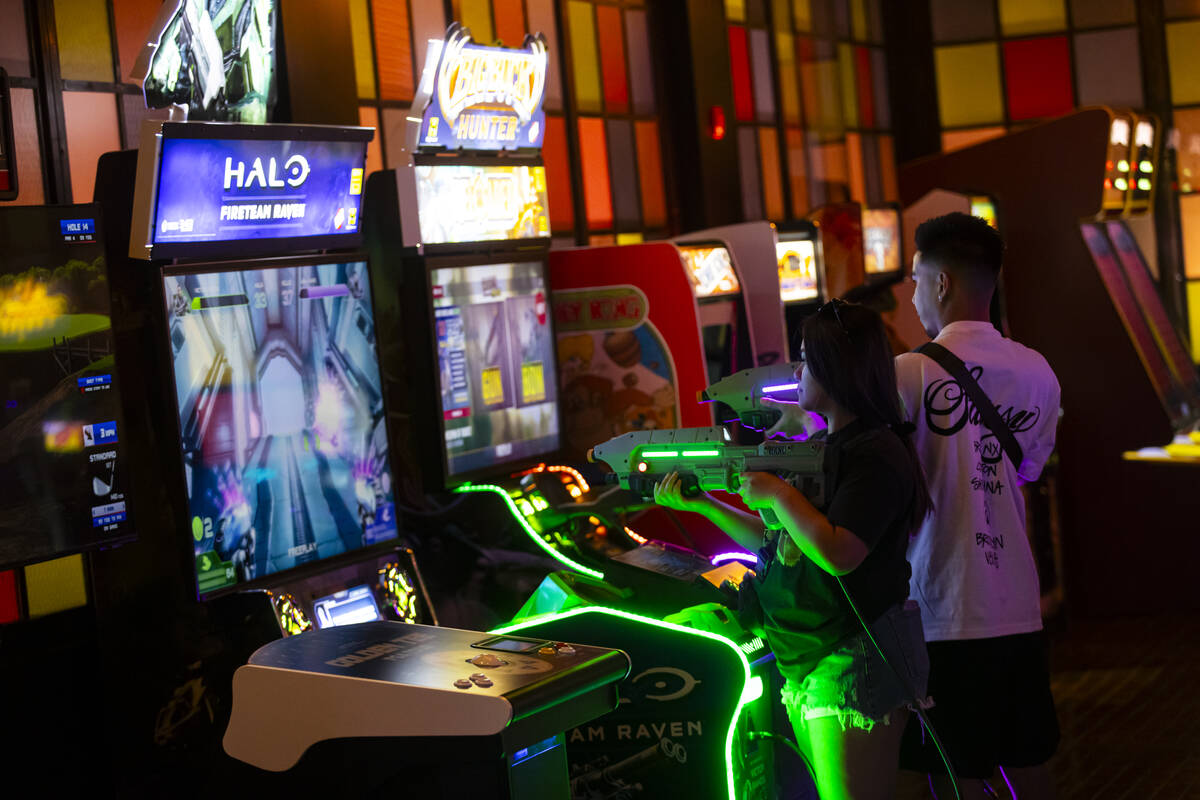 People play games at the Bonus Round arcade bar at The District at MGM Grand on Thursday, May 2 ...
