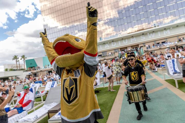 Golden Knights mascot Chance the Gila monster makes an appearance during a watch party for Game ...