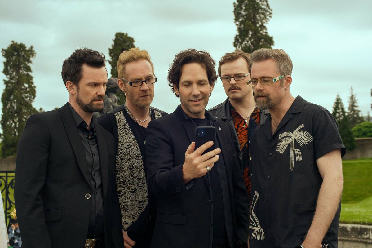 Paul Rudd (center) stars in "Power Ballad," out this weekend. (Lionsgate)