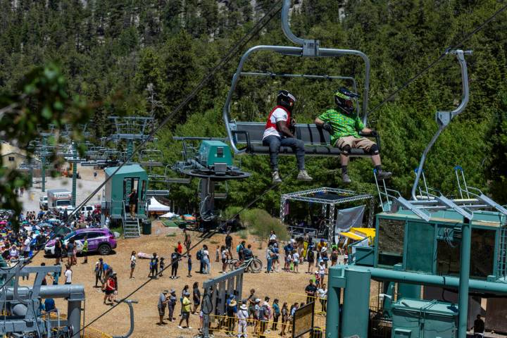 Mountain bikers check out the scenery on their way up during the Mountain Fest on Rabbit Peak a ...